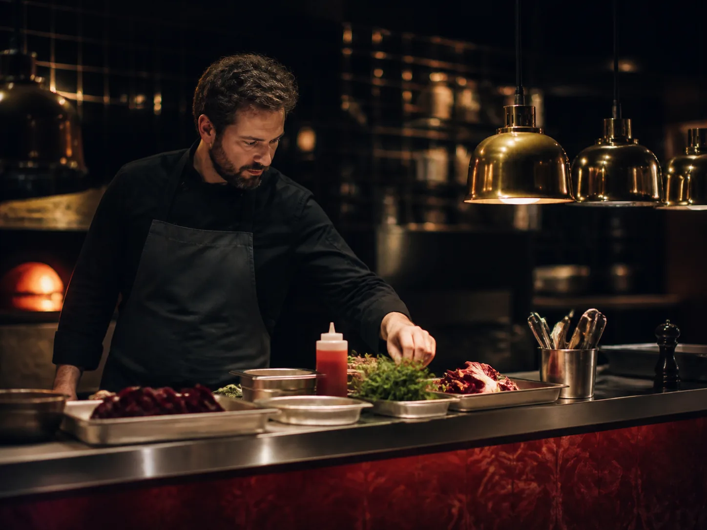 Chef preparing mise en place before evening service